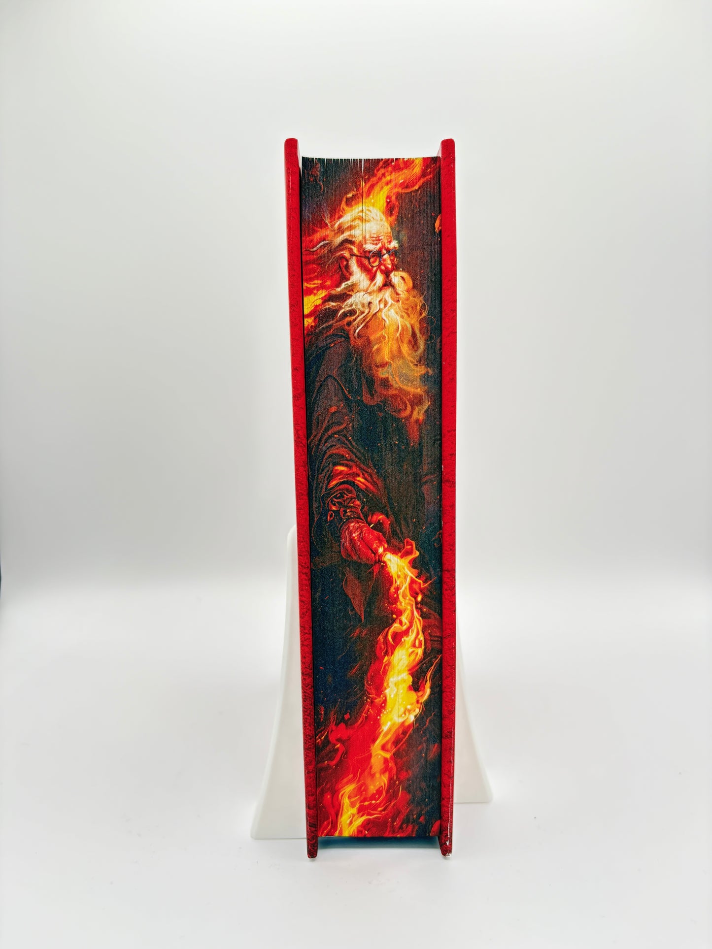 Harry Potter și Prințul Semisânge - printed edges - imaginea unui vrajitor batran care se lupta cu ajutorul flacarilor