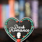 Etichetă 3D în formă de inimă neagră pentru secțiunea Dark Romance, decorată cu trandafiri roșii, viță verde și un mic craniu alb în partea de jos.