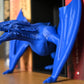 Dioramă Angry Dragon  diorama dragon albastru pe un raft cu carti
