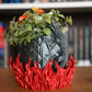 ghiveci decorativ cu ou de dragon si flacari in jurul lui inspirat din romanele fantasy
