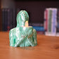 bust feminin verde menta ce este folosit ca suport de lumanare led 